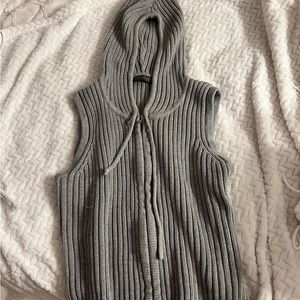 grey knitted like sleeveless hoodie